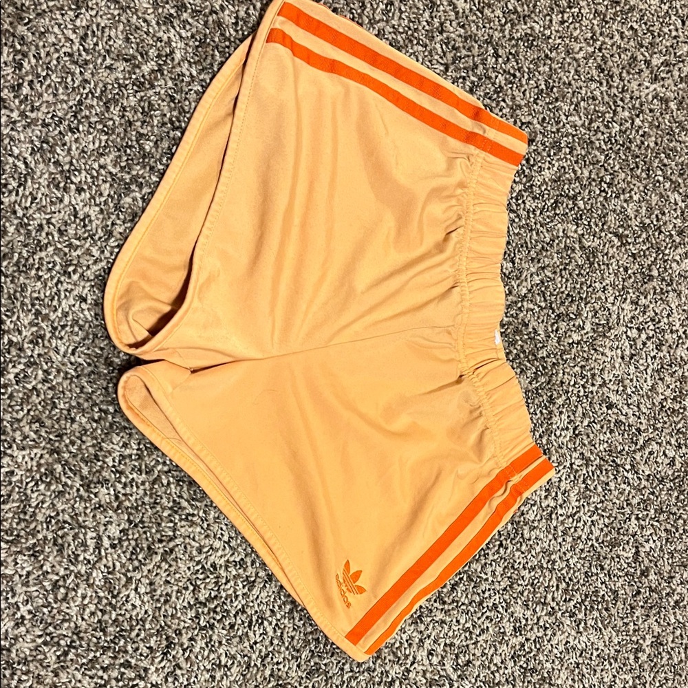 Adidas Women's Peach Athletic Shorts with Orange Stripes